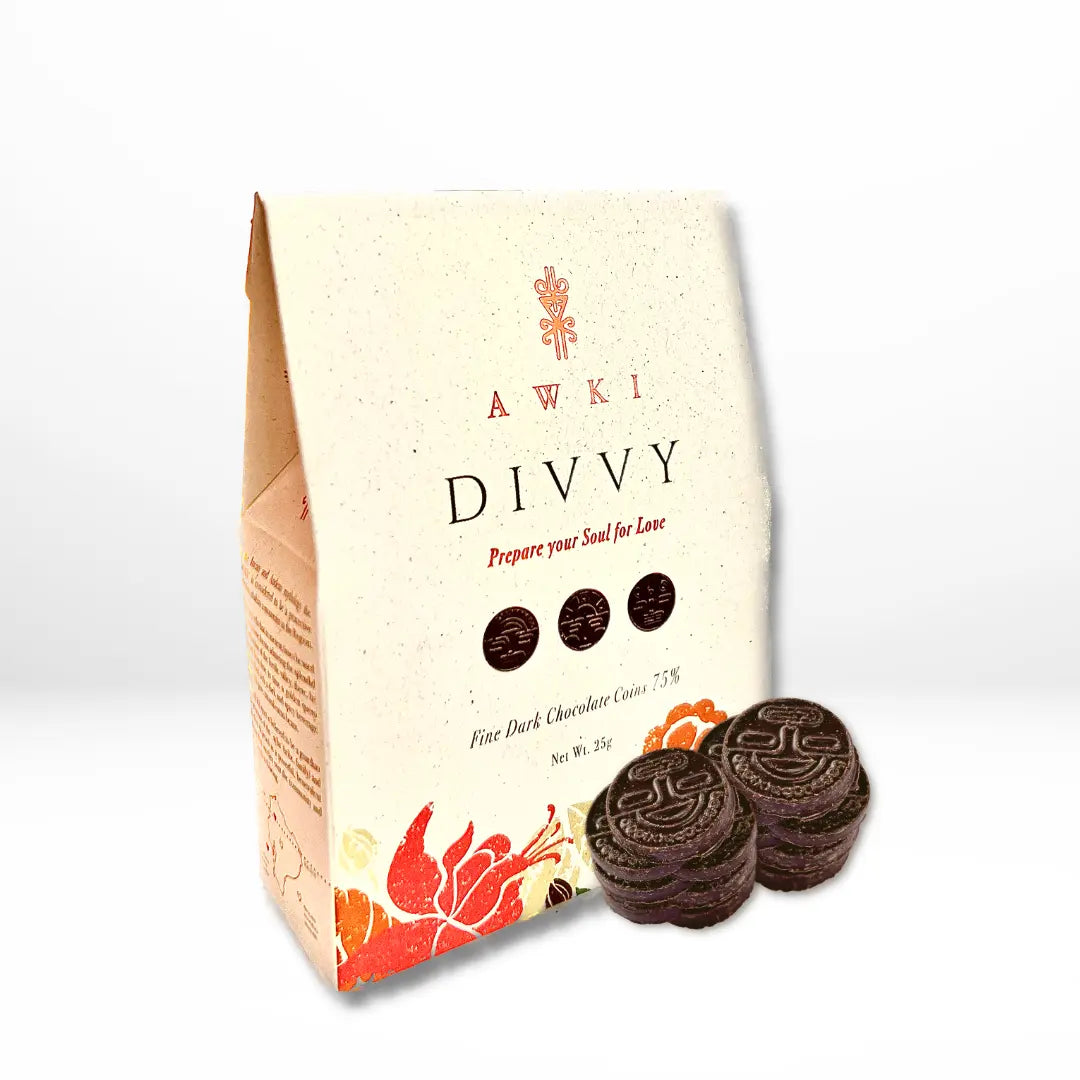 Awki Divvy 75% dark chocolate coins in 25g pouch with vibrant floral design and stacked ceremonial coins in front