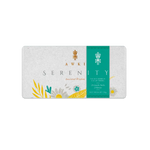 Awki SERENITY chocolate bar unwrapped next to open golden envelope and cacao beans