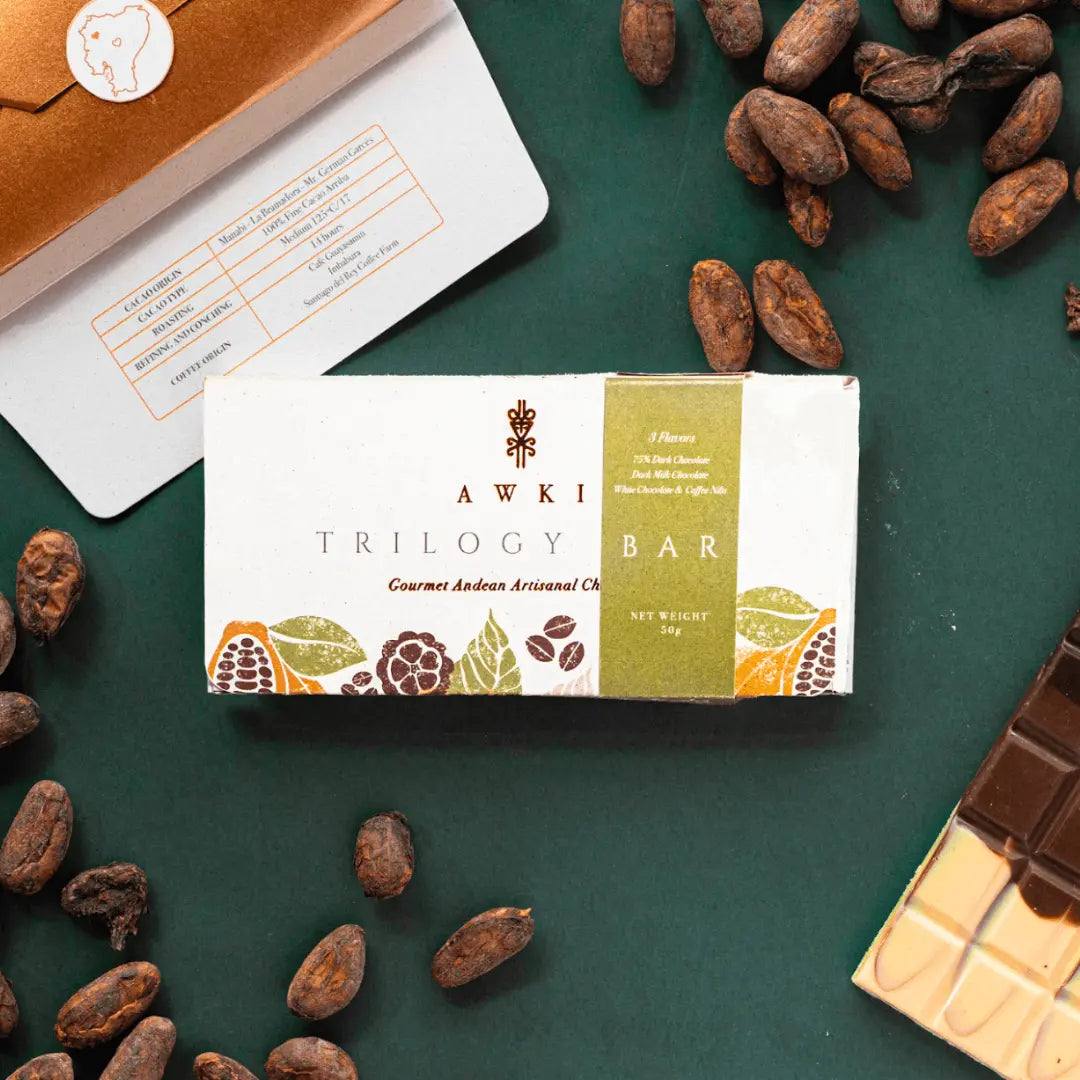 Awki Trilogy chocolate bar with cacao nibs and eco-conscious packaging, featuring three flavors of artisanal Andean chocolate on a green background